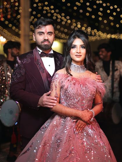 The beautiful couple, ready for their engagement night. Her makeup is bold and confident, a perfect match for the celebratory mood.