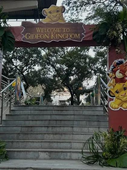 A grand entrance for a Lion King themed event, using the venue's architecture to our advantage. Character cutouts and a custom "Welcome to Gideon Kingdom" sign set the scene.