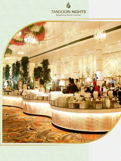 Every event setup is unique. This showcases a grand, illuminated buffet line designed for a large-scale wedding, demonstrating our ability to customize our presentation to match the venue and vision.