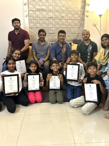 The whole group together. This photo shows our Hyderabad students, their parents, and me sitting together after a successful awards celebration. This is the supportive ecosystem of The Performers' Club.