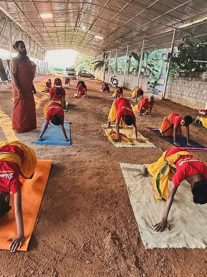 The practice of 'Surya Namaskar' greets the dawn at our camp. This sequence of yoga postures is not just exercise; it is a prayer in motion, aligning the body's energy with the sun.