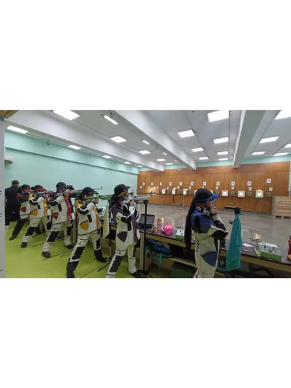 My shooters at the Vashi Centre preparing for the KSS competition. The wide-angle shot shows a full line of athletes in their shooting jackets, all aiming in unison, which speaks to the discipline and collective focus of my high-performance teams.