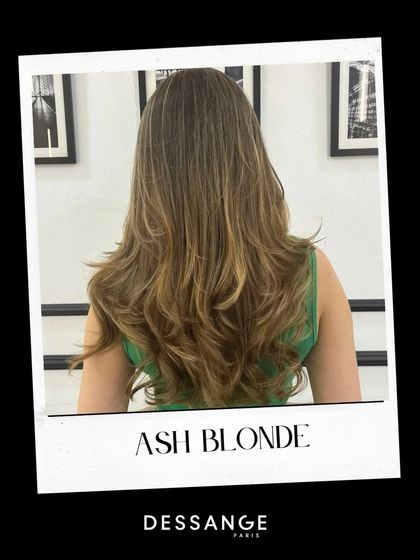 Your hair deserves a main character moment. This Ash Blonde look is cool, modern, and effortlessly chic, created with a blend of highlights for a natural, dimensional finish.