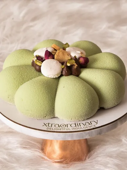 Where Middle Eastern elegance meets French finesse. My Kunafa Entremet is a modern take on a classic, with a beautiful green velvet finish and pistachio garnish.