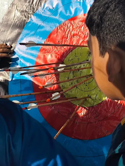 A close-up of a tight arrow grouping on the target. This is the result of practice, patience, and good coaching.