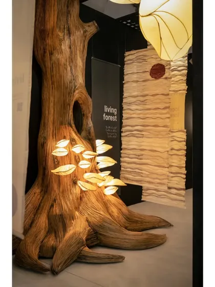 We brought a forest to life indoors for the 'Living Forest' exhibition. The centerpiece was this giant, sculptural tree, with glowing mushroom lights sprouting from its trunk. These lights were made from Lantana, an invasive weed, turning something destructive into an object of beauty and telling a powerful story of ecological balance.