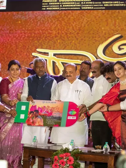 For large-scale corporate events like the 'Kasinasara' audio launch, we focus on capturing the defining moments. This group photograph showcases our ability to organize and shoot key stakeholders during a busy live event.