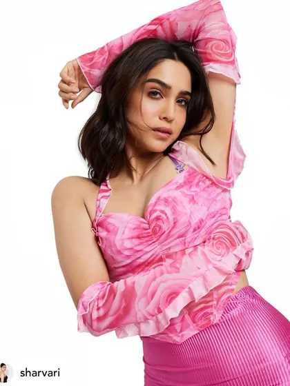 Another angle of Sharvari's pink look, showing how the makeup complements the delicate, rosy pattern of her top.