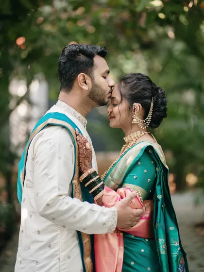 A gentle kiss on the forehead is a timeless expression of love and protection. We framed this shot to feel serene and heartfelt, emphasizing the emotional bond they share.