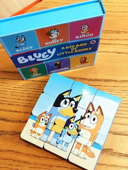 'Bluey's Big Box of Little Books' is a fun puzzle and book set that introduces all the beloved characters from the show.