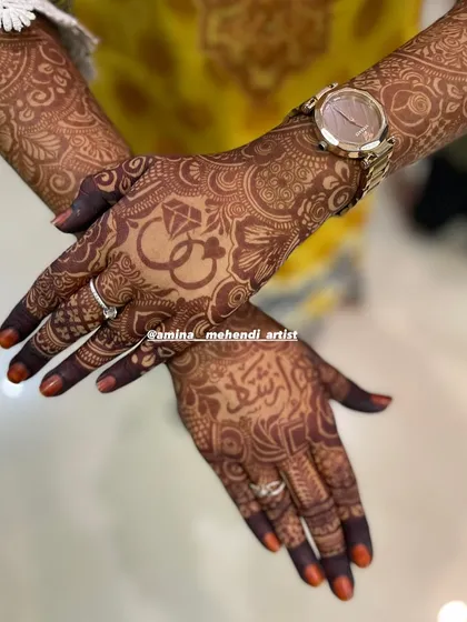 The one-day stain looks beautiful with personalized elements like the ring motif and Arabic script.