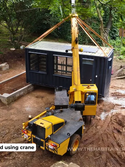 The delivery and installation process is a critical step. Here, you can see a crane carefully positioning a container unit for a retail store in Coorg, a perfect solution for remote locations that need a quick setup.