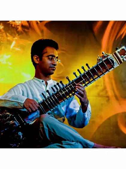 A powerful image with a fiery background, representing the energy and passion of my 'Zitar' or electric sitar performances.