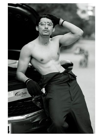 A conceptual men's portrait with a narrative. Shot in black and white, this image of a mechanic creates a rugged, cinematic feel, perfect for storytelling or a character-driven portfolio.