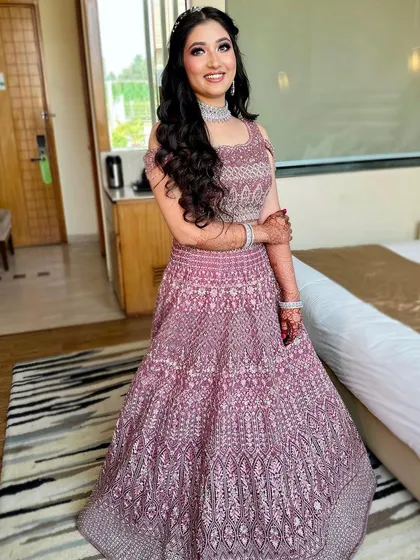 A happy and radiant bride-to-be. Her smile says it all! The makeup enhances her features without overpowering them, making her look like the best version of herself.