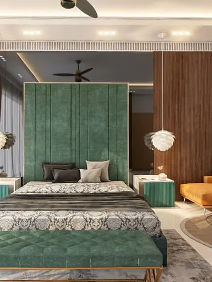 Another perspective of the green and yellow bedroom, showing the layout of the seating area. The design creates a vibrant yet comfortable space that is full of personality and style.