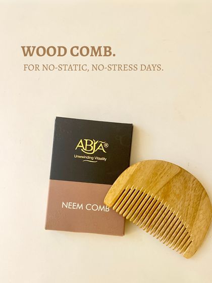 A simple message: Wood comb for no-static, no-stress days. Say no to plastic in your self-care routine.