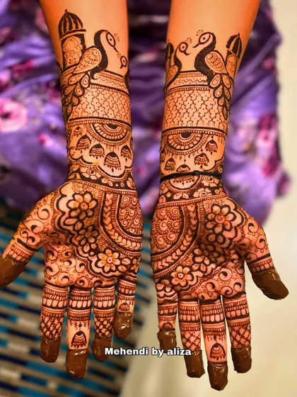A beautiful design with peacocks and floral motifs, perfect for a bride or for any festive occasion.