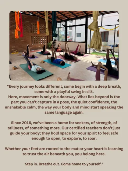 This is a view of our studio, a space where different journeys unfold simultaneously. Some students are finding stillness on the mat while others are learning to soar in aerial silks, all part of our supportive community.