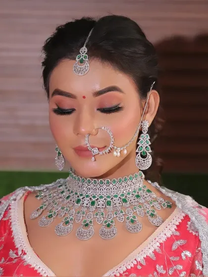 A close-up of this bride's flawless makeup. The soft pink eyeshadow and perfectly defined brows enhance her features beautifully.