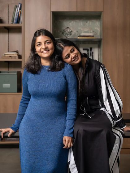 A portrait of us in our creative space. We believe that a strong partnership, built on trust and shared vision, is essential for creating soulful and impactful designs.