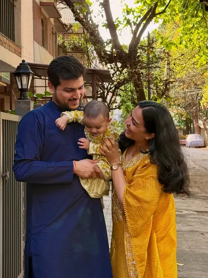 A happy family picture in our ethnic wear for Roop Chaudas. This photo captures the joy of the festive season and our coordinated traditional outfits, ideal for fashion and lifestyle brands.