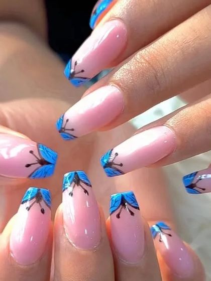 A close-up of the unique blue floral tip design.