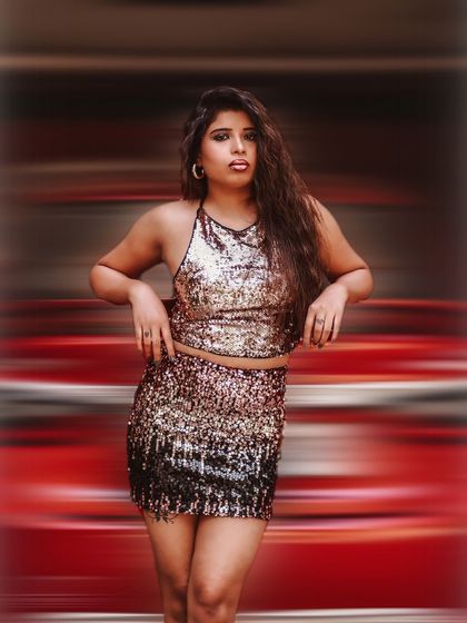 A direct and confident portrait where the motion blur effect creates a sense of speed and excitement.