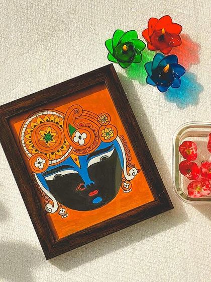 A portrait of Lord Srinathji, a form of Krishna as a seven year old child. This 9x10 inch framed painting makes a perfect gift, capturing his divine and gentle expression.