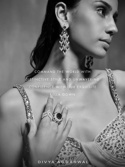 A black and white artistic shot of the Bella Gown, emphasizing the power and confidence it inspires through its distinctive style and detailed craftsmanship.