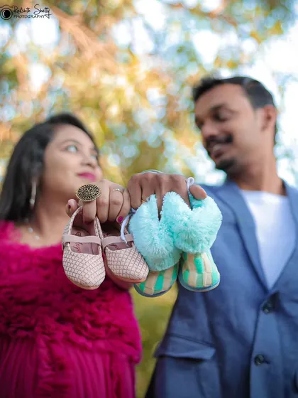 It's all about the little details. Incorporating tiny baby shoes is a sweet and creative way to symbolize the new life you are about to welcome.
