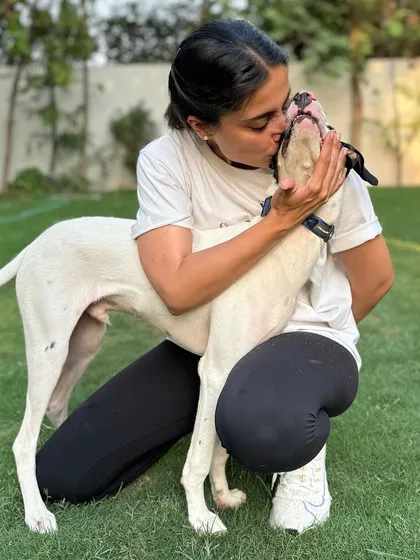 A sweet kiss from TinTin. His guardian's testimonial is a huge source of motivation for me.
