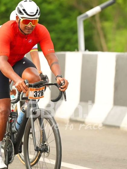 A masters rider, showing his experience and strength on the road.