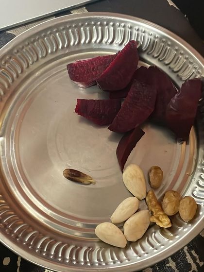 What you eat is as important as how you move. This simple plate of beetroot, almonds, walnuts, and dates is a nutrient-dense snack, but it's important to be mindful of portion sizes, especially with nuts and dried fruit.