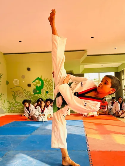 The focus and determination on this student's face as he executes a high side kick says it all. We are building champions.