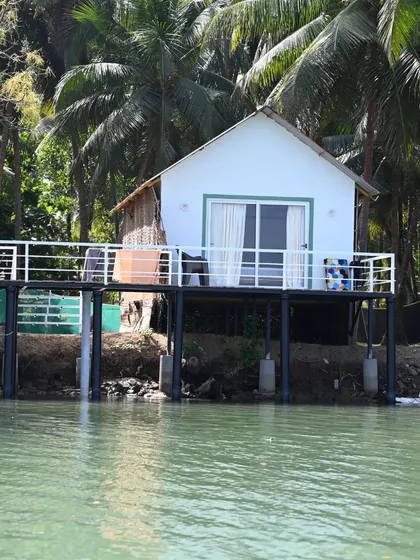 A picturesque water villa, a sight we often see during our backwater explorations.