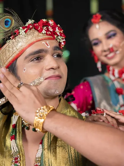 A tender moment between Radha and Krishna. In narrative choreography, conveying emotion and the relationship between characters is just as important as the steps themselves.