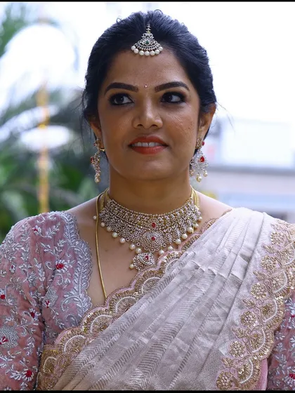 Photos from my housewarming, wearing a saree and blouse I designed myself. I took a plain tissue saree and completely transformed it with a hand-worked scalloped border and a custom-stitched velvet blouse. It’s a look that’s very close to my heart.