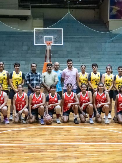 The competing teams from the All-Star charity match pose for a group photo. These events foster sportsmanship and community while providing a competitive outlet for serious players.