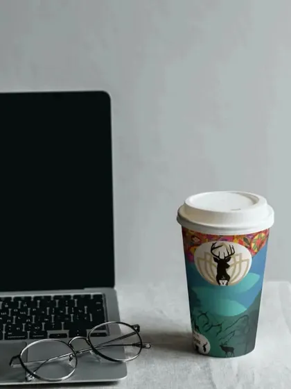 This is another look at the same coffee cup packaging concept, this time in a workspace setting. A good design should look great anywhere, whether it's on a cafe table or on your desk.