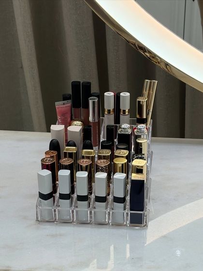 A clear acrylic organizer is a perfect solution for storing a lipstick collection. It keeps every color visible and easily accessible, making it simple to find the shade you're looking for.