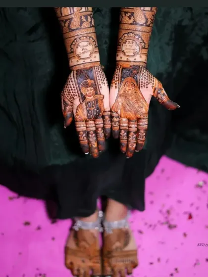 A full view of a bride's mehandi, with portraits on the hands and matching intricate designs on the feet. The portraits are framed beautifully, making them the centerpiece of the art.