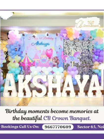 A vibrant circus-themed first birthday backdrop. The colorful decor, complete with a carousel horse and light-up name, creates a playful and exciting atmosphere for a child's party.