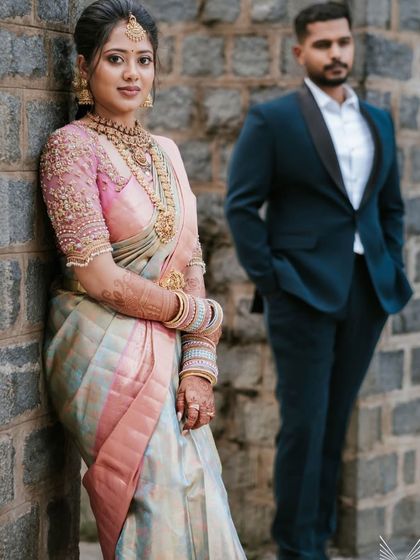 Our client Nivedha looking stunning for her engagement. She is wearing a classic temple jewellery set that pairs beautifully with her pastel-coloured saree.