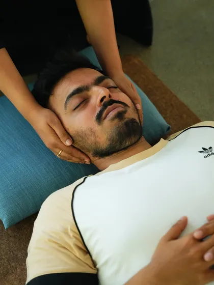 A moment of peace during a personal healing session. I believe in the power of gentle, focused energy work to release tension and restore calm. It is an honor to hold space for you and witness the energy shift as you reconnect with your inner self.