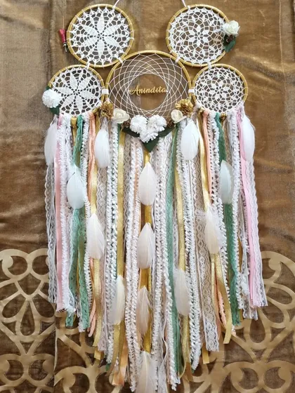A touch of gold dust for your walls. This custom cluster dreamcatcher, personalized with the name 'Anindita', features soft pastel and gold tones for a truly magical feel.