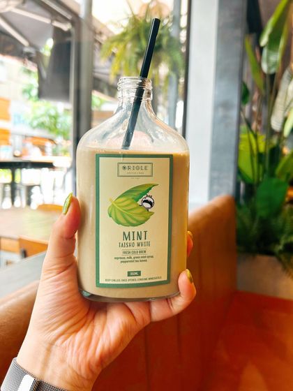 Trying a bottled Mint Iced Latte from Oriole Coffee in Singapore. I love discovering and sharing unique local finds like this.
