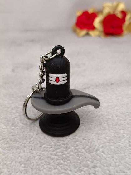A keychain with a miniature Shiv Ling, another great option for those who want to carry a symbol of their faith.