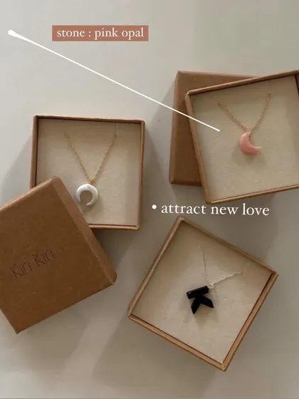 My 'āśra' Luna pendants, boxed and ready for gifting. This image shows the pink opal for attracting new love, white moonstone for luck, and black onyx for protection.