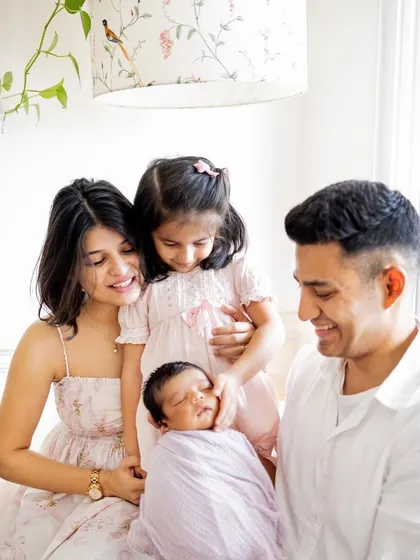 This black and white family portrait captures the pure, unadulterated love that fills the room when a new baby arrives. I focus on these real connections, creating timeless images for you to cherish as your family grows.